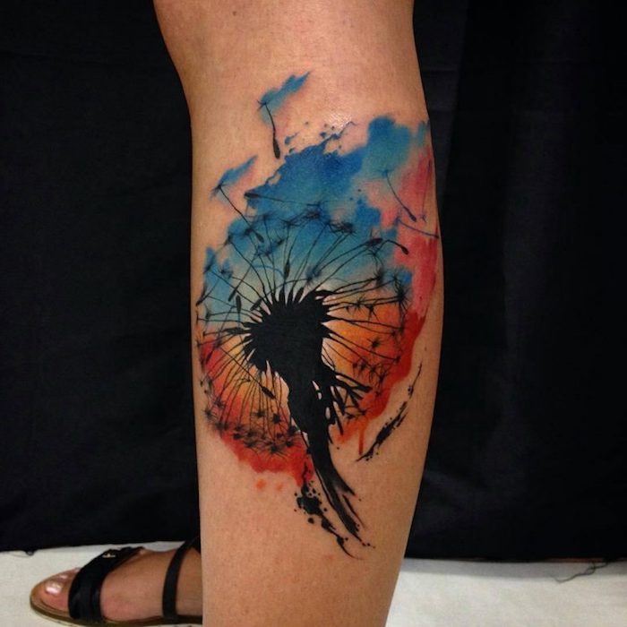 velika obojena maslačak tetovaža na nozi, akvarelna tetovaža