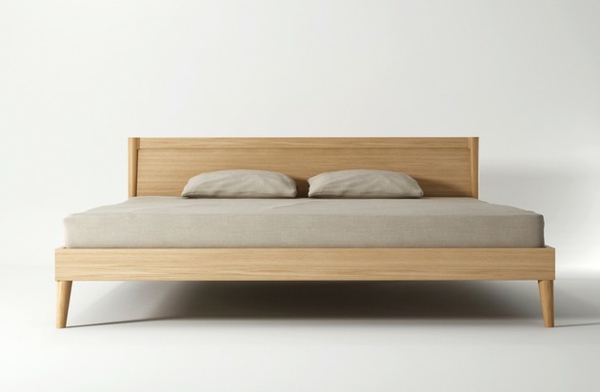 Σκανδιναβικό κρεβάτι-μπεζ σεντόνια και λευκό φόντο