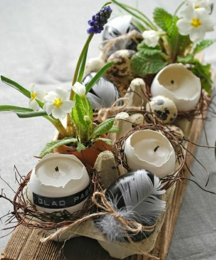 A húsvéti díszeket a tojáshéjból készült gyertyatartók és vázák készítik