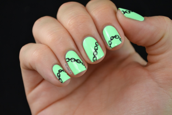 Diseño de uñas de color verde brillante