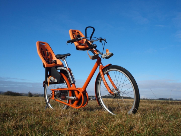 Oranssi polkupyörä istuin-lasten nykyajan käytännön malli