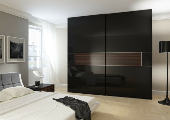 klizna vrata-vlastite-graditi-s-elegantne-crno-design-u-moderne spavaće sobe