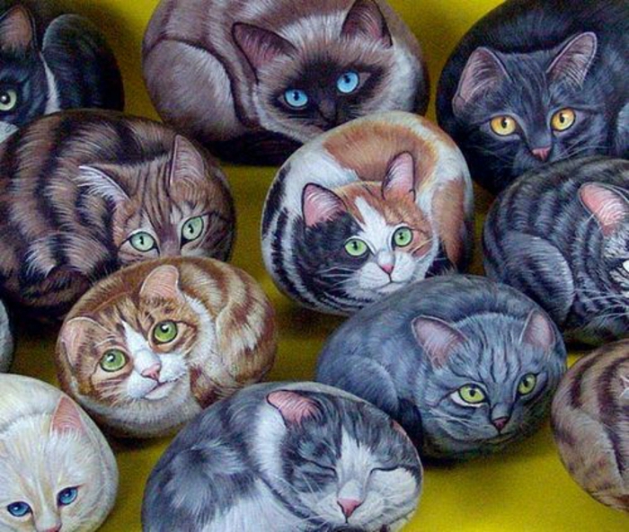 رسمت الحجارة القط الفراء العين ألوان مختلفة