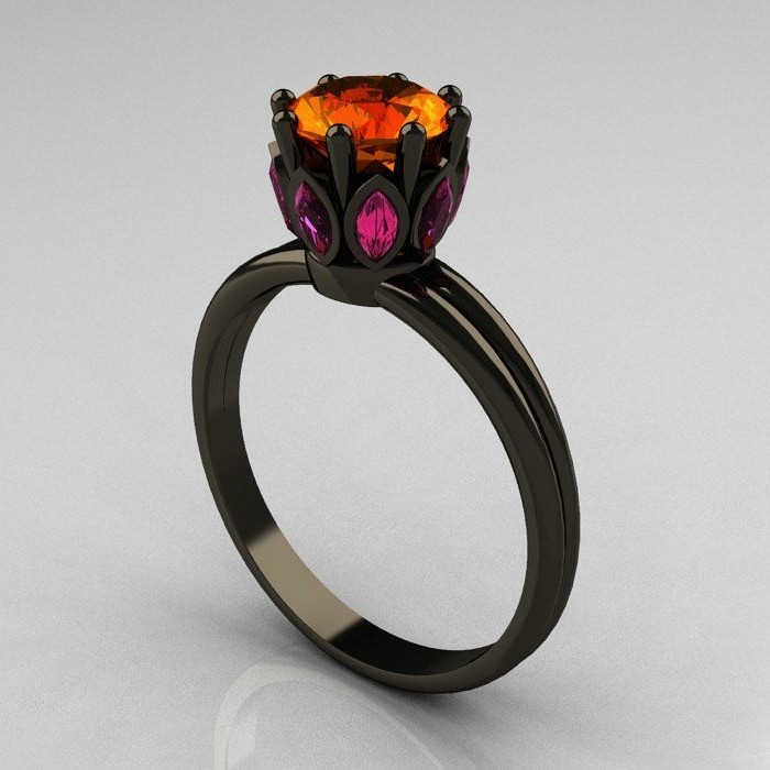 модни пръстени-черно злато сапфирени камъни в топли нюанси