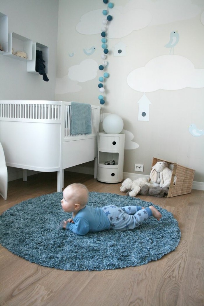 Babyroom-design bleu tapis