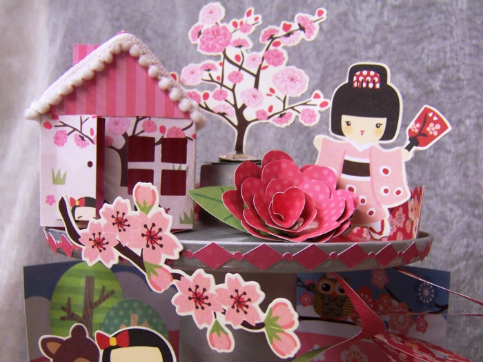 розова композиция от японски черешови цветя, момиче с кимоно и малка къща - занаяти с картон