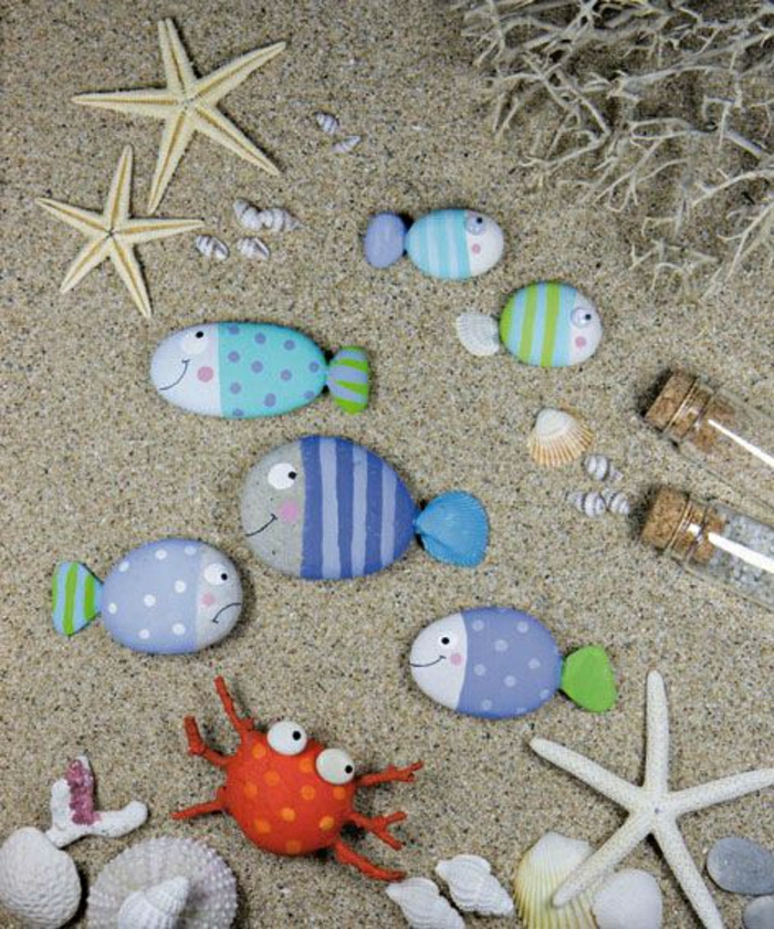 maalattu kiviä Kala-meritähti kuoret Cancer hiekkaa