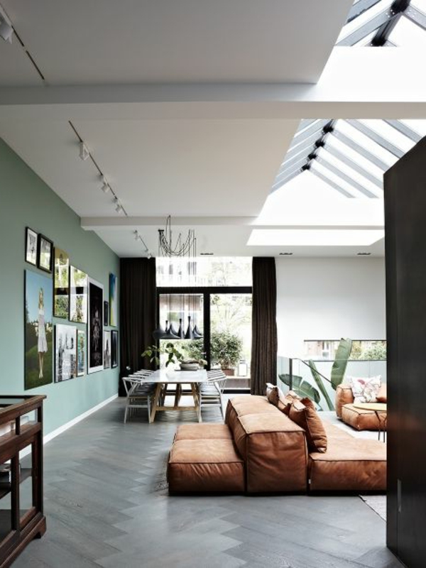 piso a techo-windows-elegantes sofás-en-sala de estar