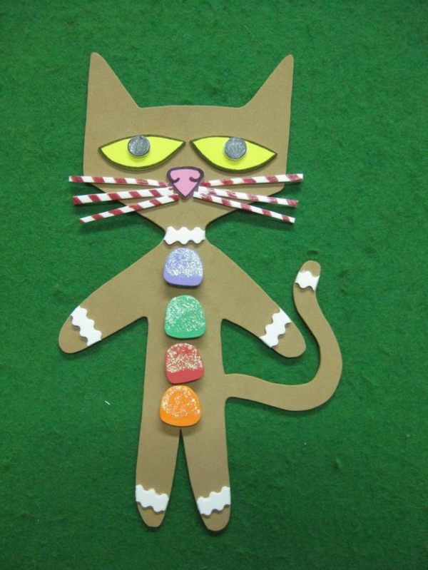 ideas de manualidades para jardín de infantes - un gato de papel - fondo en color verde