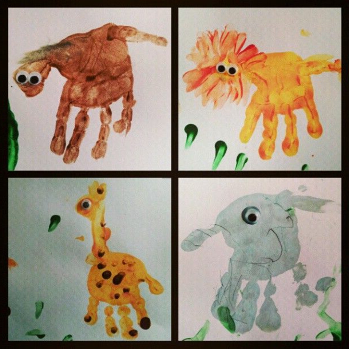 大象，长颈鹿，狮子，猴子。手印图片