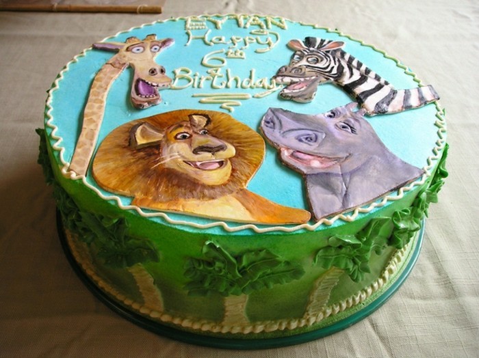 كعكة عيد ميلاد خلفية أسد-والبعض الحيوانات