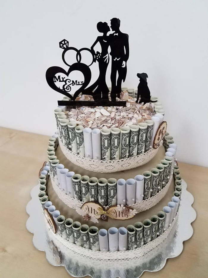 Készítsen esküvői tortát a bankjegyekből, készítsen kreatív készpénzes ajándékot, lépésről lépésre