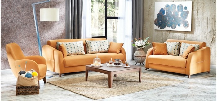 Viihtyisä-olohuone-suunnittelu-sohva-tuoli-puna-stehlampe-seinät-musta-maljakko