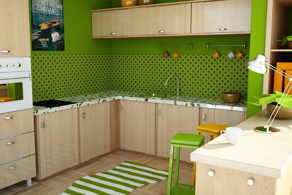 дървени шкафове и зелен цвят на кухнята