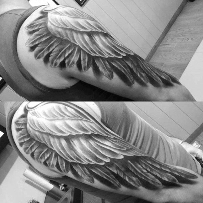 ovdje je još jedna ideja za veliki anđeo tetovaža za muškarce - ovdje su ruke s velikim crnim tetovažama krila
