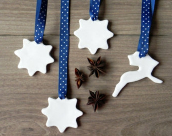 bijeli božićni ukras - ukrasne zvijezde koje možete objesiti