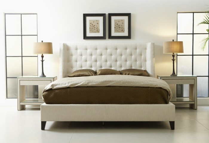 zanimljivo-dizajn-tapecirani kreveti-s-krevetna box-dvije slike-an-der-zid-u-spavaće sobe