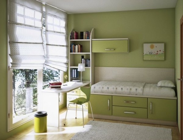 kis ágy és íróasztal zöld színben az óvodában