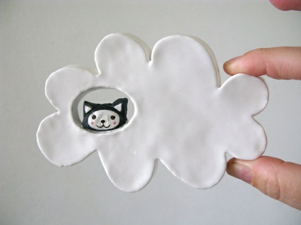φιγούρες-of-κεραμικού-σύννεφο γάτα