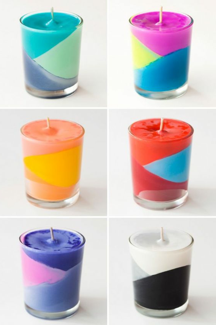 velas coloridas con formas geométricas de candelabros y tizas pastel