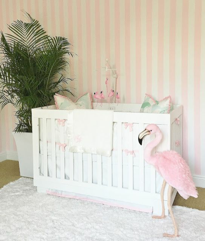 bútorok óvodai ötletek fehér ágy flamingó virágok tenyér zöld növény párnák ötletek szőnyeg
