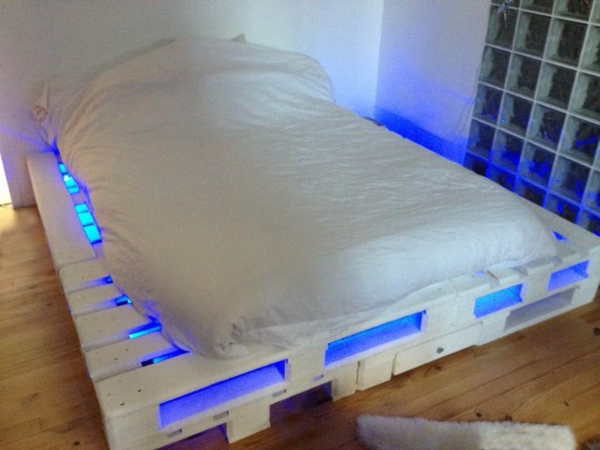 bed with underneath blue light