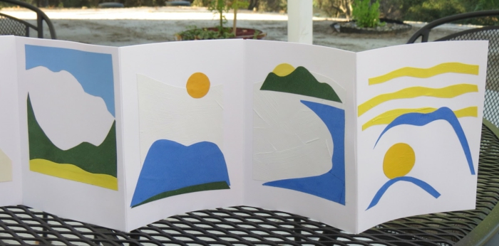 Taitettava kirja, jonka lapset ovat liittäneet tarinaa auringosta
