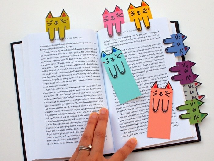 hacer un libro - muchas figuras de origami con una mirada divertida