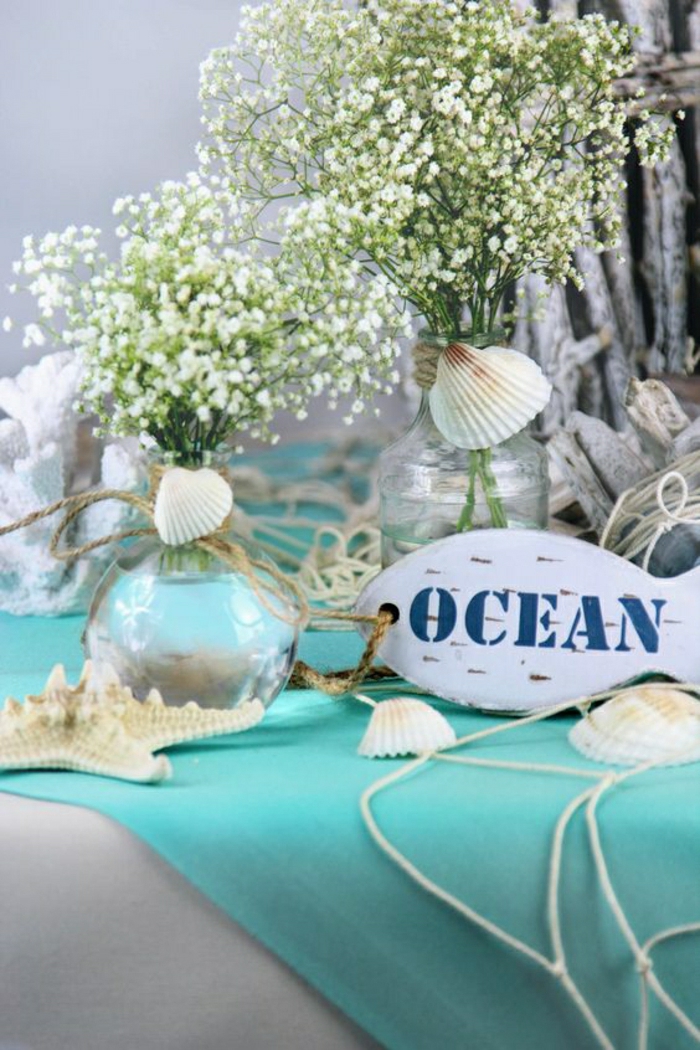 Tengeri díszítő asztal díszítő vázák héjjal és tengeri csillaggal