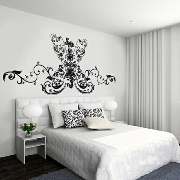 hálószoba modern felszerelés - fekete festő stencil a falon és a fehér design