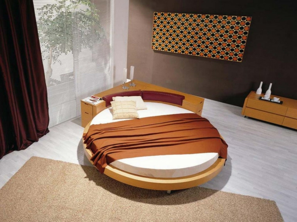 moderna spavaća soba-krevet-dizajn-okruglo-tamne zavjese