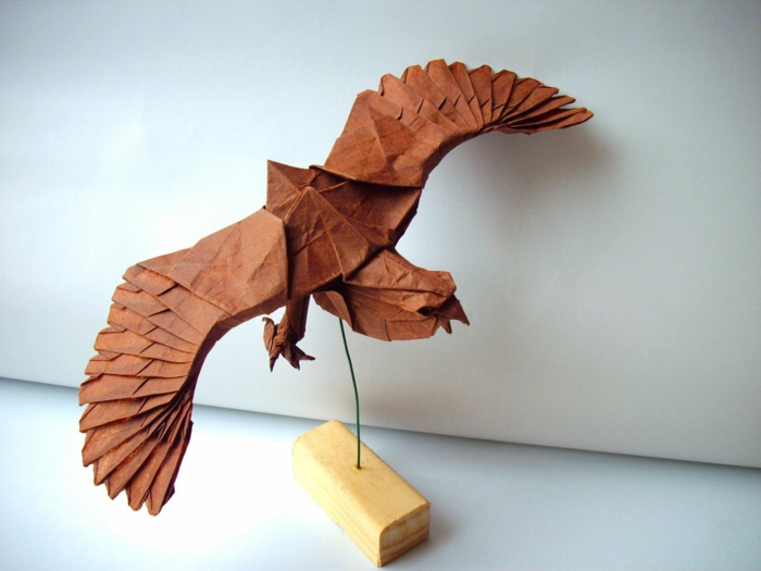 Origami animales-a-águila - fondo brillante