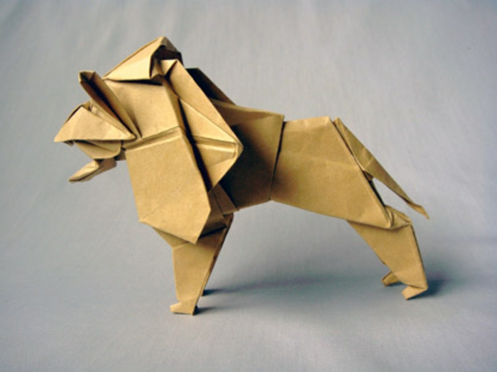 Origami animales-un-león - fondo gris