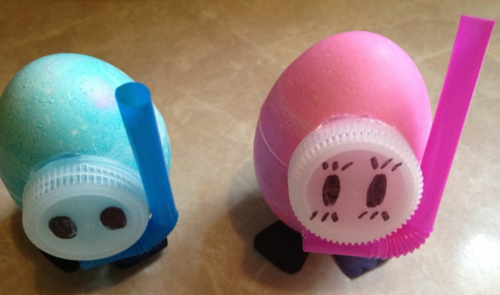 egy lány és egy fiú, akik búvárok - tojás arcok - újrahasznosított anyagok