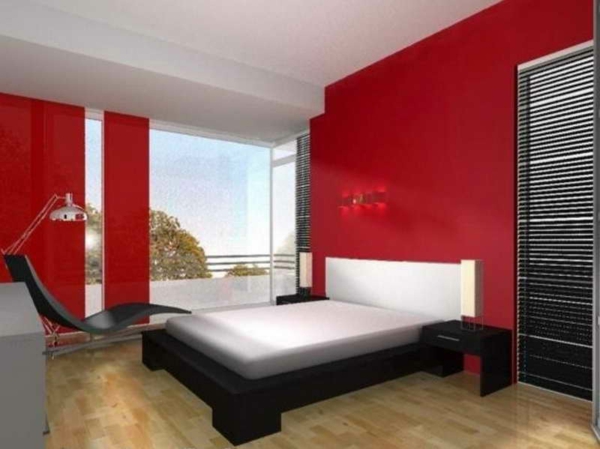 غرفة نوم مع سرير أبيض وجدران حمراء