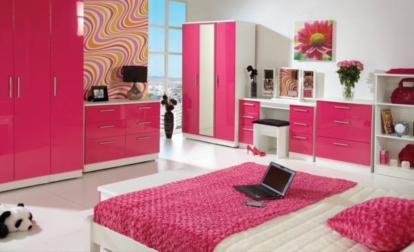 ideas de diseño de dormitorio cyclamen color lap top en la cama
