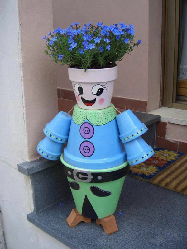 pot de fleurs en forme de super-créatif