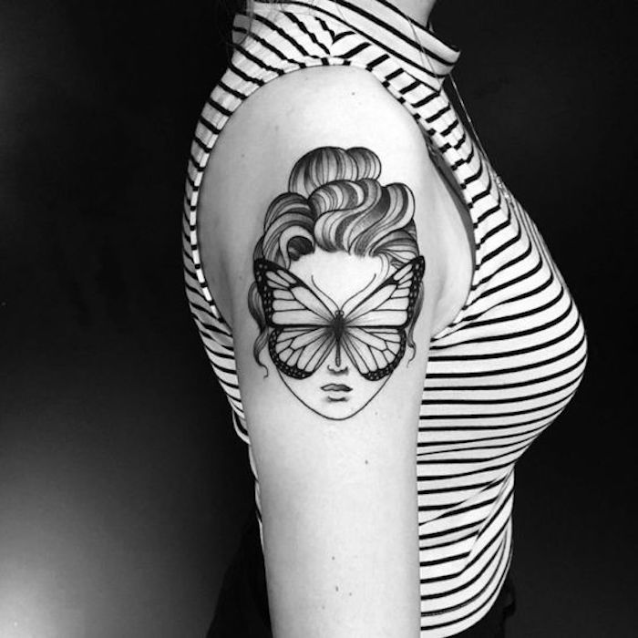 Интересна татуировка като произведение на изкуството - лице на жена с пеперуда, вместо с татуировки за очи
