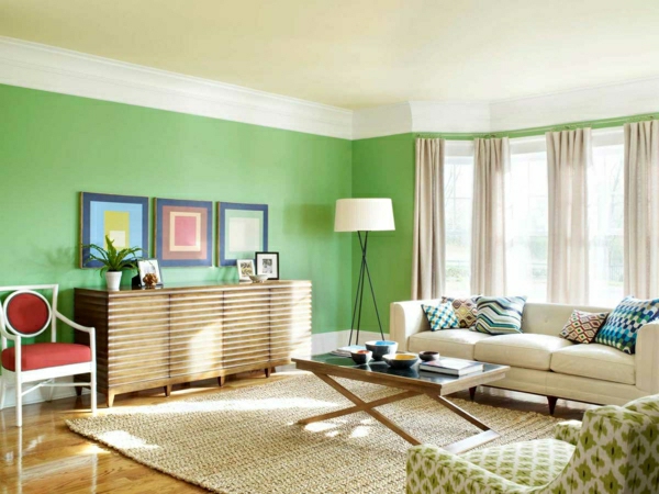 seinä-maalaus-ideat-olohuone-vihreä-valo-verhot-beige-kolme kuvaa seinälle